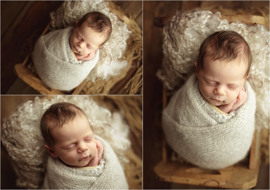 sleepy wrapped newborn with gray knit props