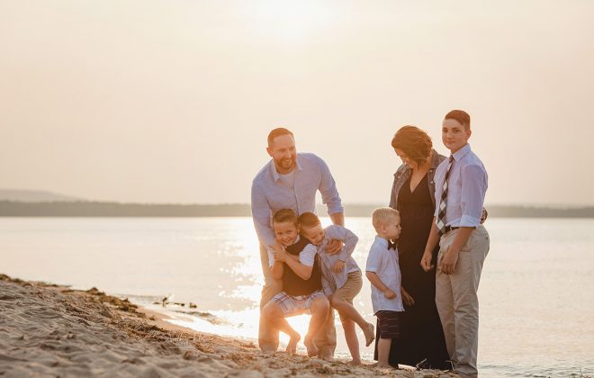 family photo session at au train beach on shores of lake superior in munising michigan